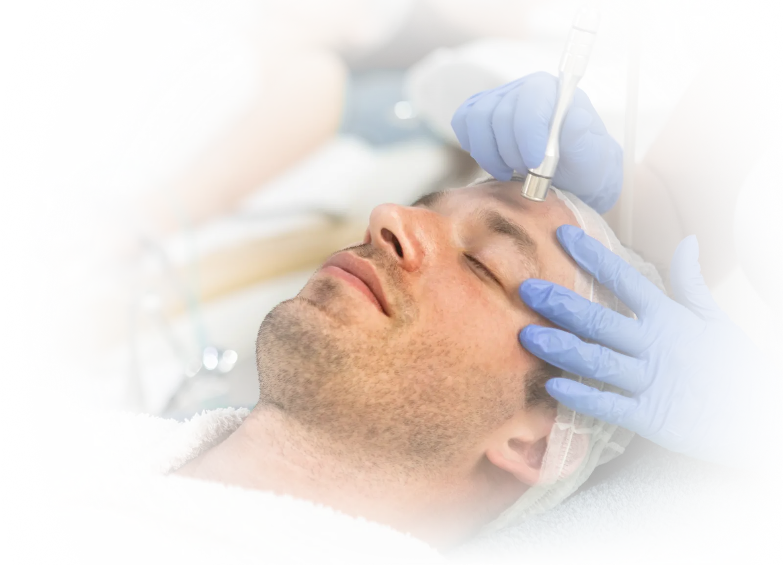 Man receiving a professional facial treatment with microneedling, representing advanced regenerative skincare and PRP facials in Bellingham at Gallant Lion Medical