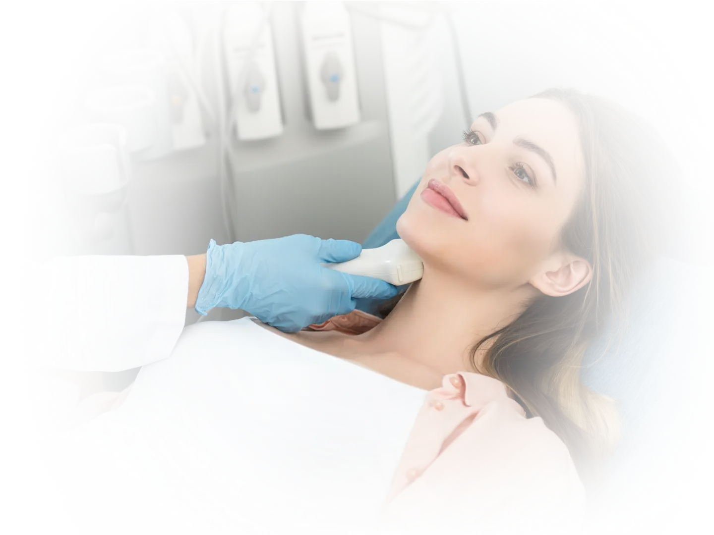 Smiling woman receiving a hormone-related neck exam from a medical provider, representing non-invasive hormone and body treatment for daily wellness at Gallant Lion Medical