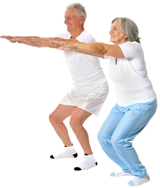 Active older couple performing squats together, symbolizing improved energy, stability, and vitality through hormone replacement therapy at Gallant Lion Medical